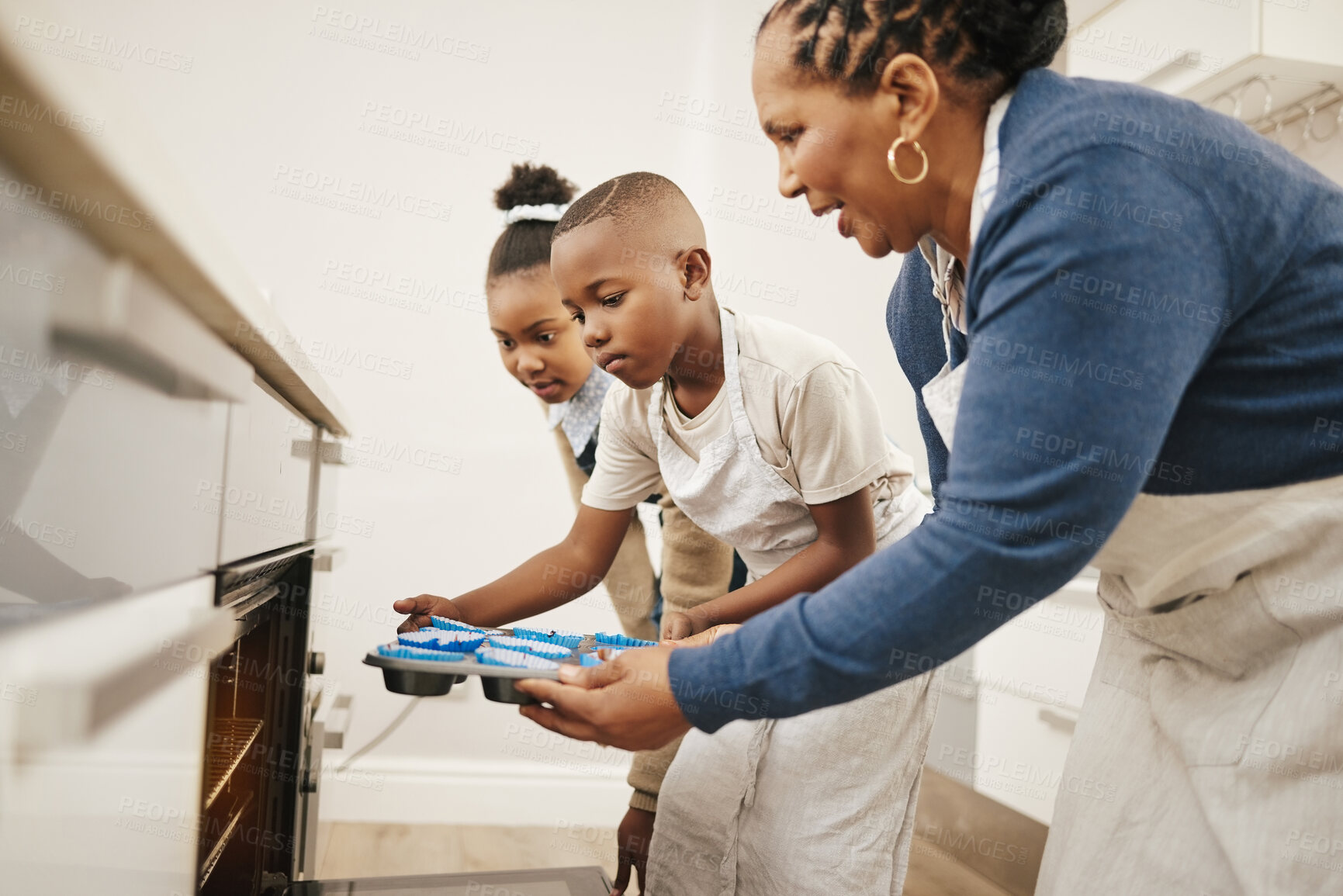 Buy stock photo Grandmother, children and oven with baking tray in kitchen for dessert, cupcakes or cooking batter at home. Grandma, young kids or junior bakers with equipment for heat, cooker or creation at house