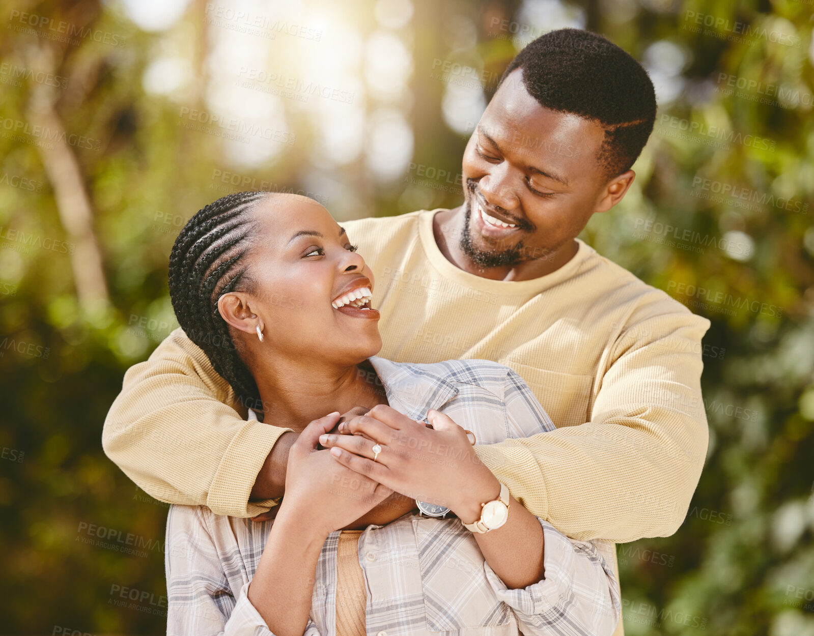 Buy stock photo Couple, connection and hug in nature for love, care and relationship with partner, security and bonding. Man, woman and smile for embrace, support and trust with commitment, loyalty and happy as date