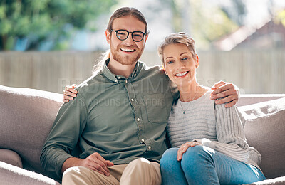 Buy stock photo Man, mother and portrait in house on sofa for relax, bonding and support with smile in lounge. Happy, love and face of male person with glasses or woman with hug from Australia in living room of home