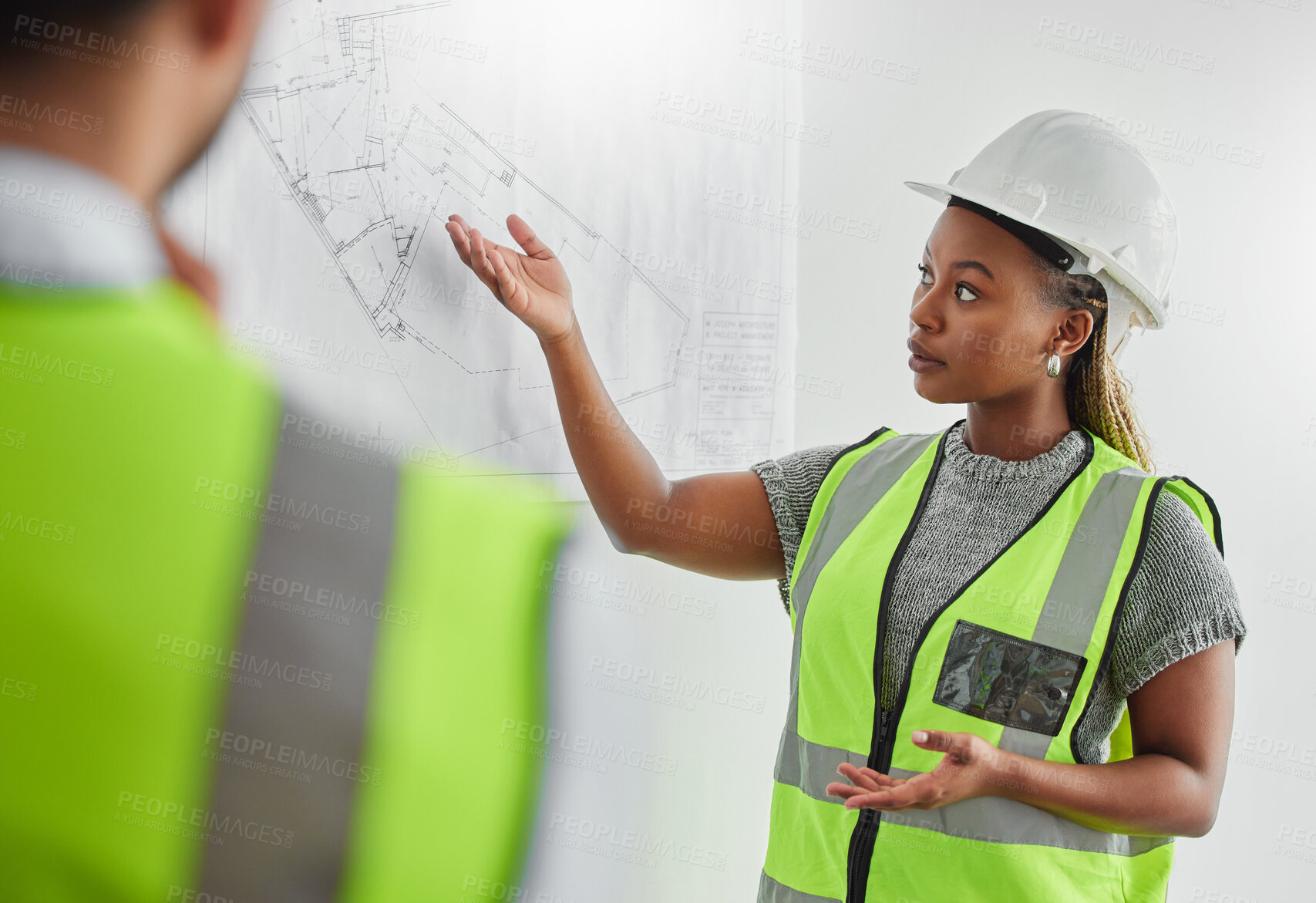 Buy stock photo Shot of two architects planning in an office at work