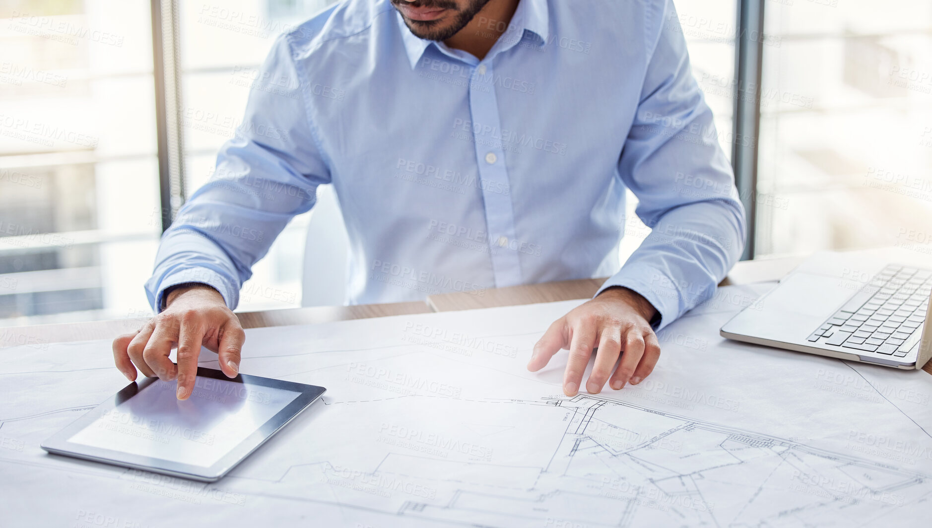 Buy stock photo Shot of an unrecognizable businessperson working in an office