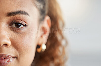 Buy stock photo Eye, face and portrait of a woman with space for mockup, advertising or vision on a studio background. Zoom and half headshot of african person or student with natural beauty, focus and concentration
