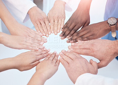 Buy stock photo Doctors, people and hands in circle for teamwork in day for solidarity, support and diversity in hospital. Team building, healthcare or global collaboration for international company, trust or vision