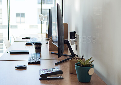 Buy stock photo Shot of an empty workspace at an office
