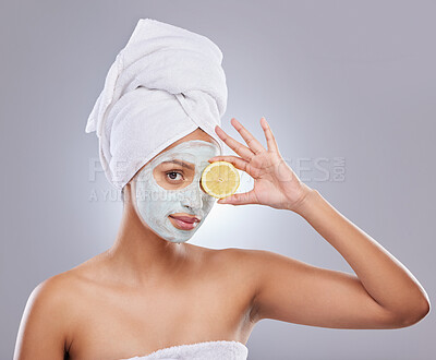 Buy stock photo Mask, skincare and lemon with portrait of woman in studio for beauty, natural cosmetics and vitamin c. Self care, glow and spa with female model and citrus fruit on grey background for detox product