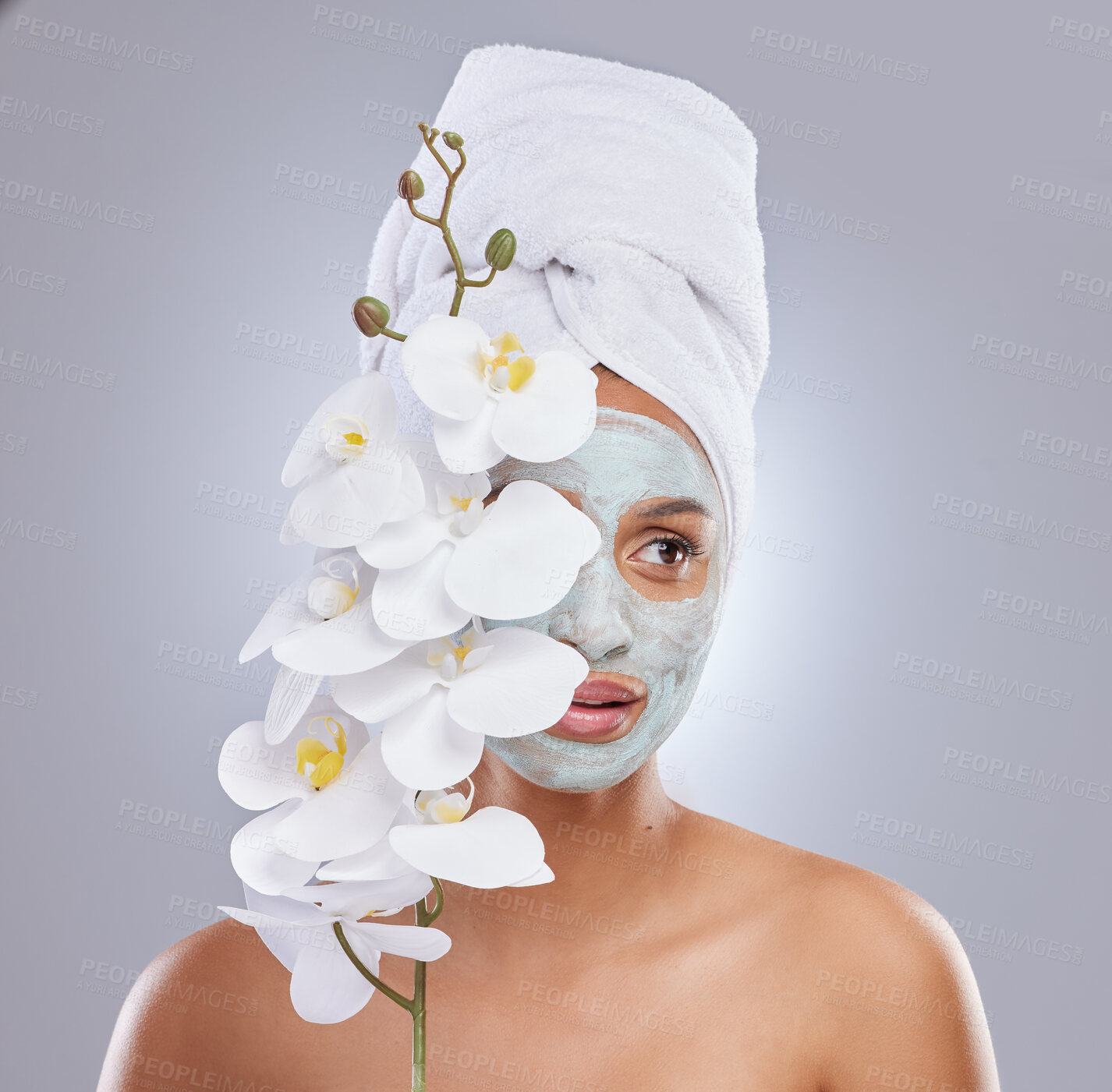 Buy stock photo Orchid, woman and face mask for skincare, cosmetic and facial treatment on white background. Beauty, natural or organic for female person, plant and dermatology for detox and exfoliate product