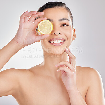 Buy stock photo Studio, lemon and face of woman, spa and brightening of skin, beauty and wellness with facial. White background, healthy and happiness for person, hand and exfoliate for pores and results of skincare