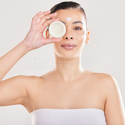 Buy stock photo Portrait, cream container and woman with aesthetic, smile and dermatology on a white studio background. Face, person and model with lotion, shine for skincare, moisturizer and wellness with cosmetics