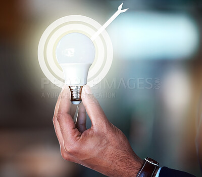 Buy stock photo Cropped shot of an unrecognisable businessman standing and holding a light bulb