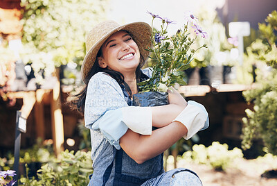 Buy stock photo Plant, outdoor garden and smile of woman hug flowers for environment, sustainability or ecology. Nature, happiness and female person for green nursery, agriculture or landscaping in backyard
