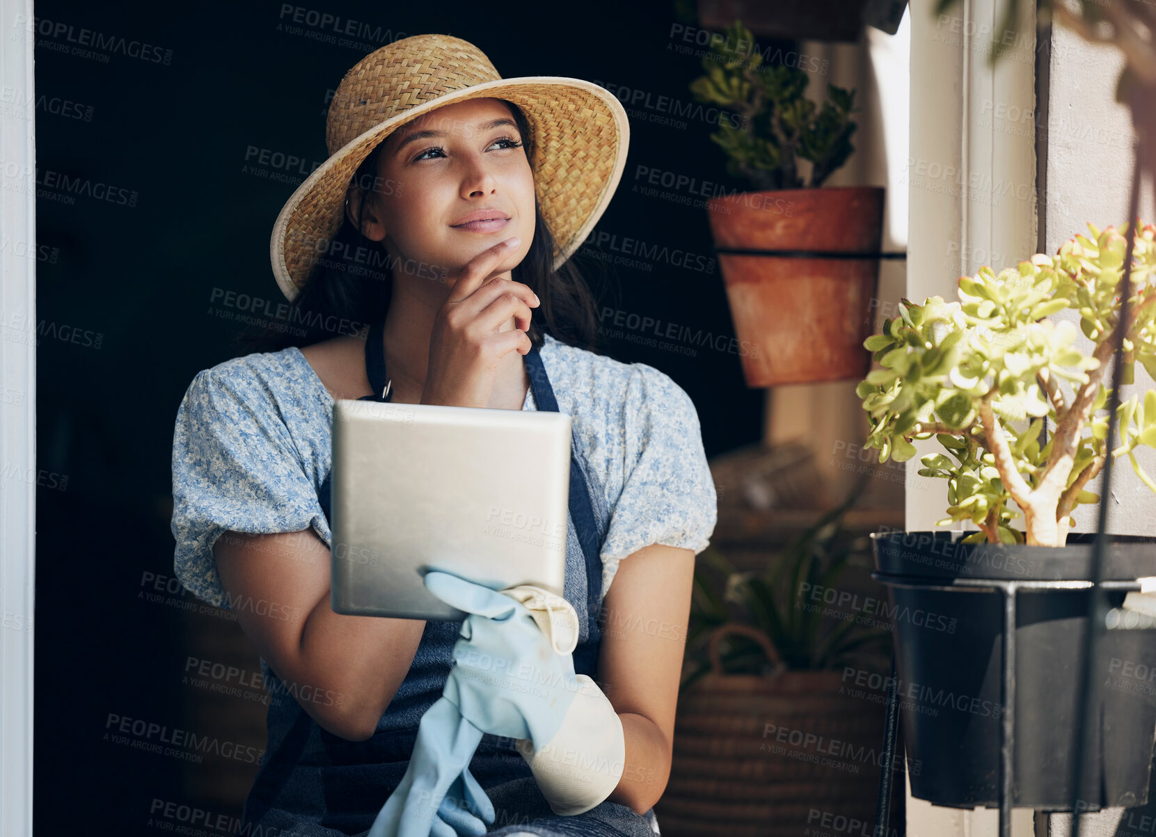 Buy stock photo Girl, florist and thinking with tablet in garden to order supplies, inventory management and market research for business. Female gardener, digital tech and thoughts or ideas for nursery planning.