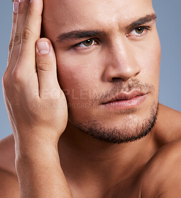 Buy stock photo Cropped shot of a man posing against a grey background