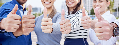 Buy stock photo Cropped shot of a group of unrecognizable businesspeople showing thumbs up while standing in their office