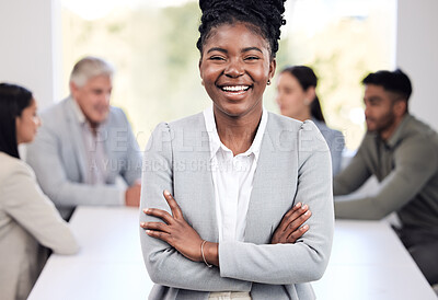 Buy stock photo Portrait, smile and a business black woman arms crossed in the boardroom with her team in the background. Leadership, workshop and confidence with a happy young female employee standing in the office