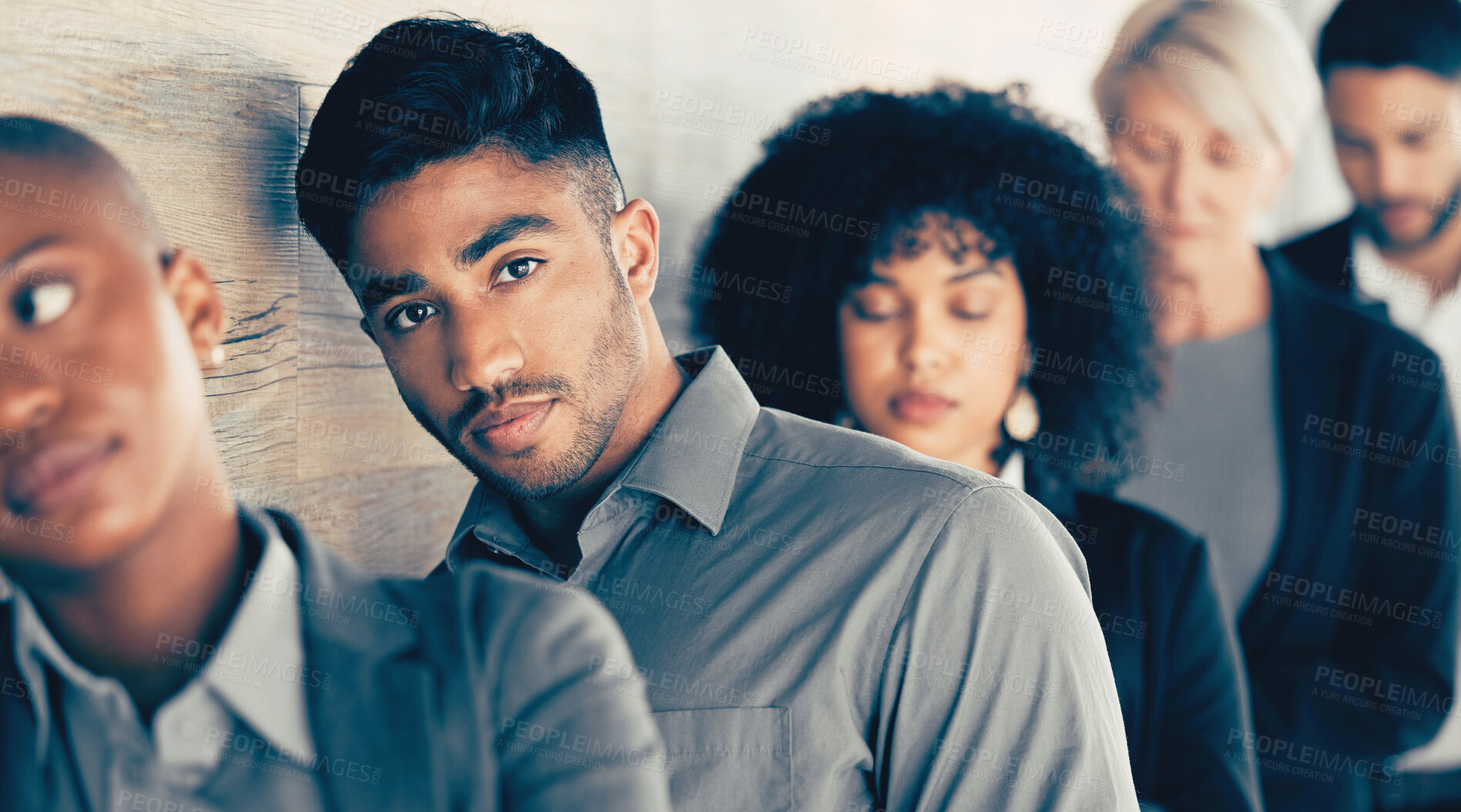 Buy stock photo Bored, queue and man in waiting room with people for job interview, recruitment or hiring. Human resources. frustrated person and group of candidates for onboarding, employment or appointment