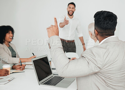 Buy stock photo Shot of a businessman raising his hand to ask a question in a meeting at work