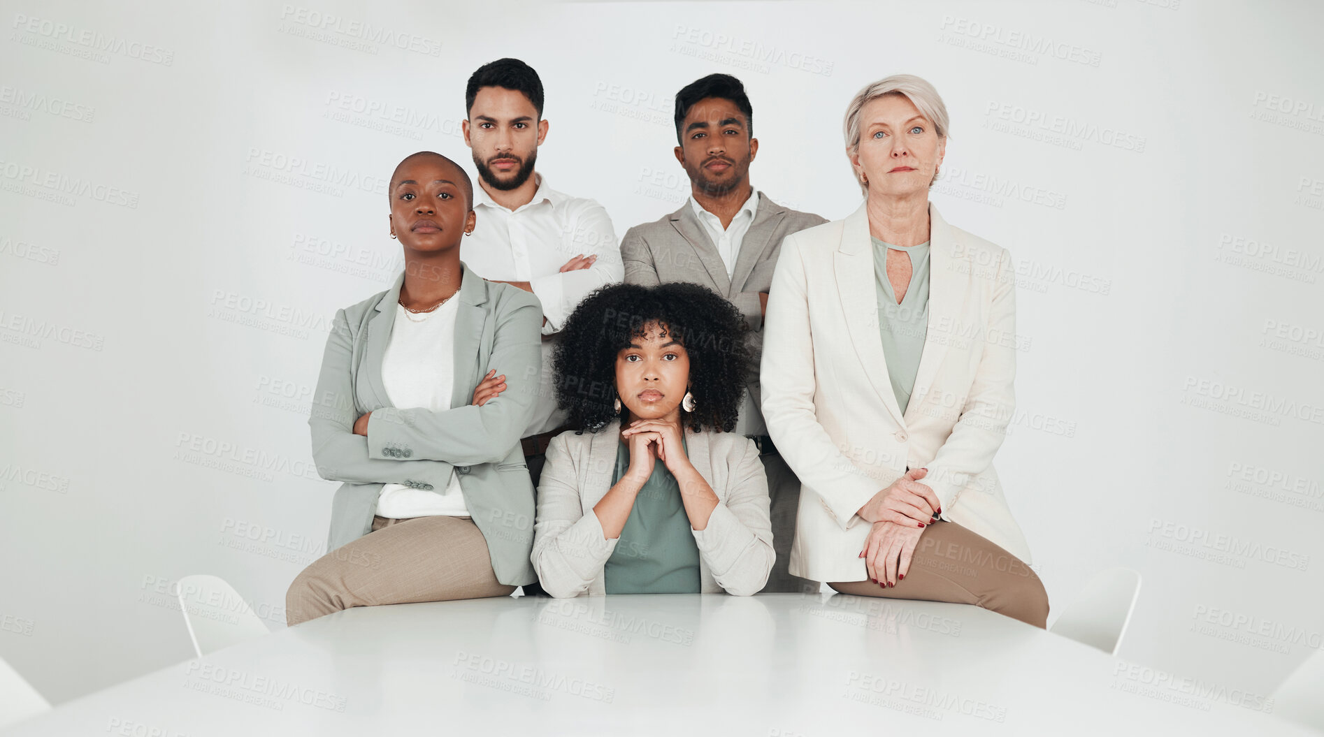 Buy stock photo Business people, serious and portrait with group by desk for company, solidarity and pride in diversity. Confident, employees and team at corporate law firm for legal career, collaboration and unity