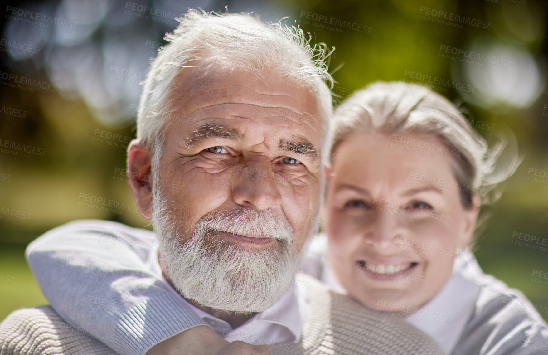 Buy stock photo Old couple hug in park with love, face and portrait with smile, retirement together with trust and support. Elderly man, woman and marriage with commitment, relationship and happy people outdoor