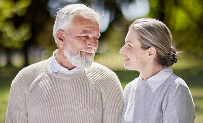 Buy stock photo Old couple in park with love and retirement together, trust and support with care and people in nature. Elderly man, woman and marriage with commitment, relationship and pension with smile outdoor