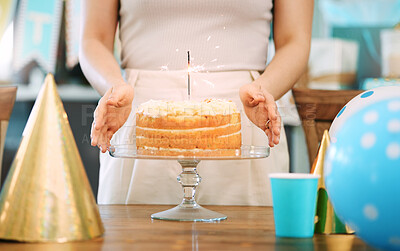 Buy stock photo Shot of an unrecognisable woman celebrating a birthday at home