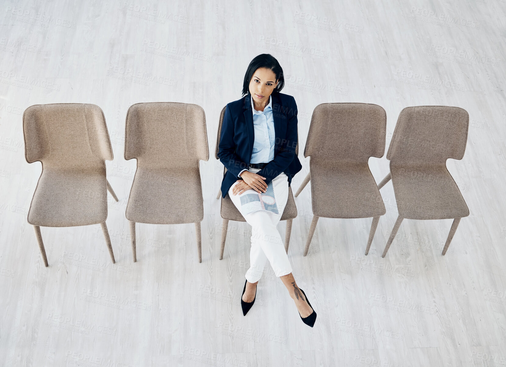 Buy stock photo Business woman, waiting room and line of chairs for interview, hiring or recruitment at the office. Portrait of female person or employee sitting for appointment, meeting or career opportunity in row