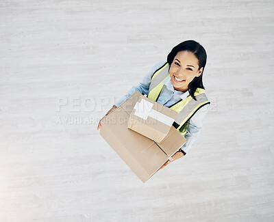 Buy stock photo Delivery, boxes and portrait of courier woman from above for logistics, cargo or shipping industry. Happy female worker with cardboard box or package from supply chain for distribution service mockup