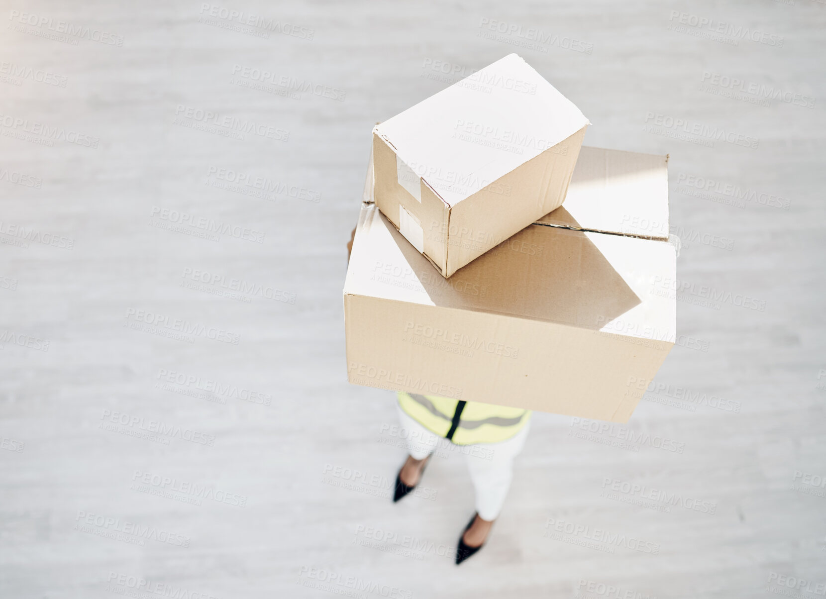 Buy stock photo Delivery, courier person and boxes or package from above for logistics, cargo or shipping industry. A worker or employee with cardboard box or parcel from supply chain for distribution service mockup