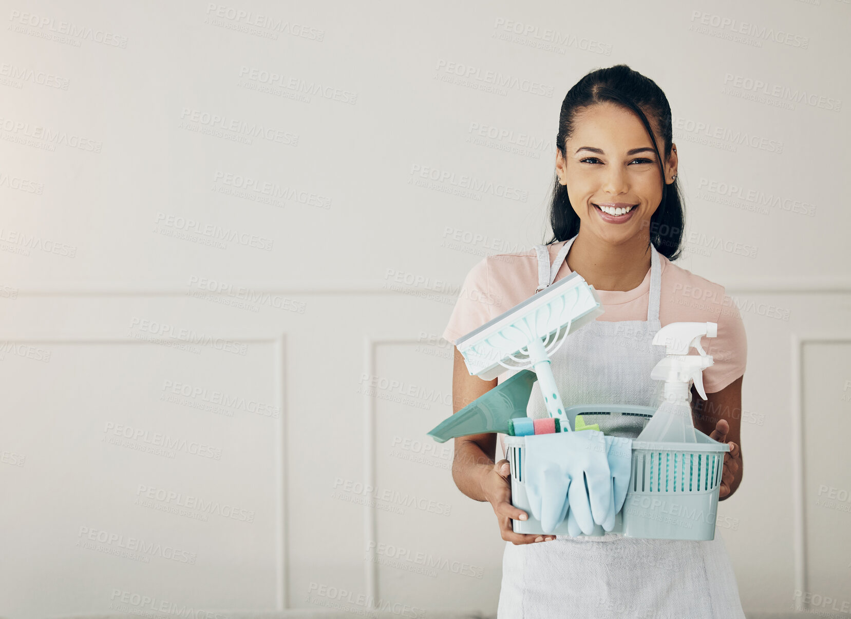 Buy stock photo Woman, cleaning supplies and smile in portrait, chemical spray and hygiene with household maintenance product. Happy female cleaner, janitor tools in basket and mockup space, service and detergent