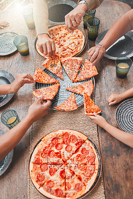 Buy stock photo Above, hands and family outside for pizza lunch for happiness, bonding and visit with excited guest. People, home and outdoor table with food or meal, carbs and fun on holiday with nutrition