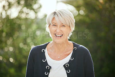 Buy stock photo Shot of a mature woman standing outside