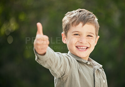 Buy stock photo Young boy, happy and thumbs up outdoor for fun, playing and agreement in green backyard with game. Male child, portrait and thank you sign in garden for childhood, development and holiday with smile