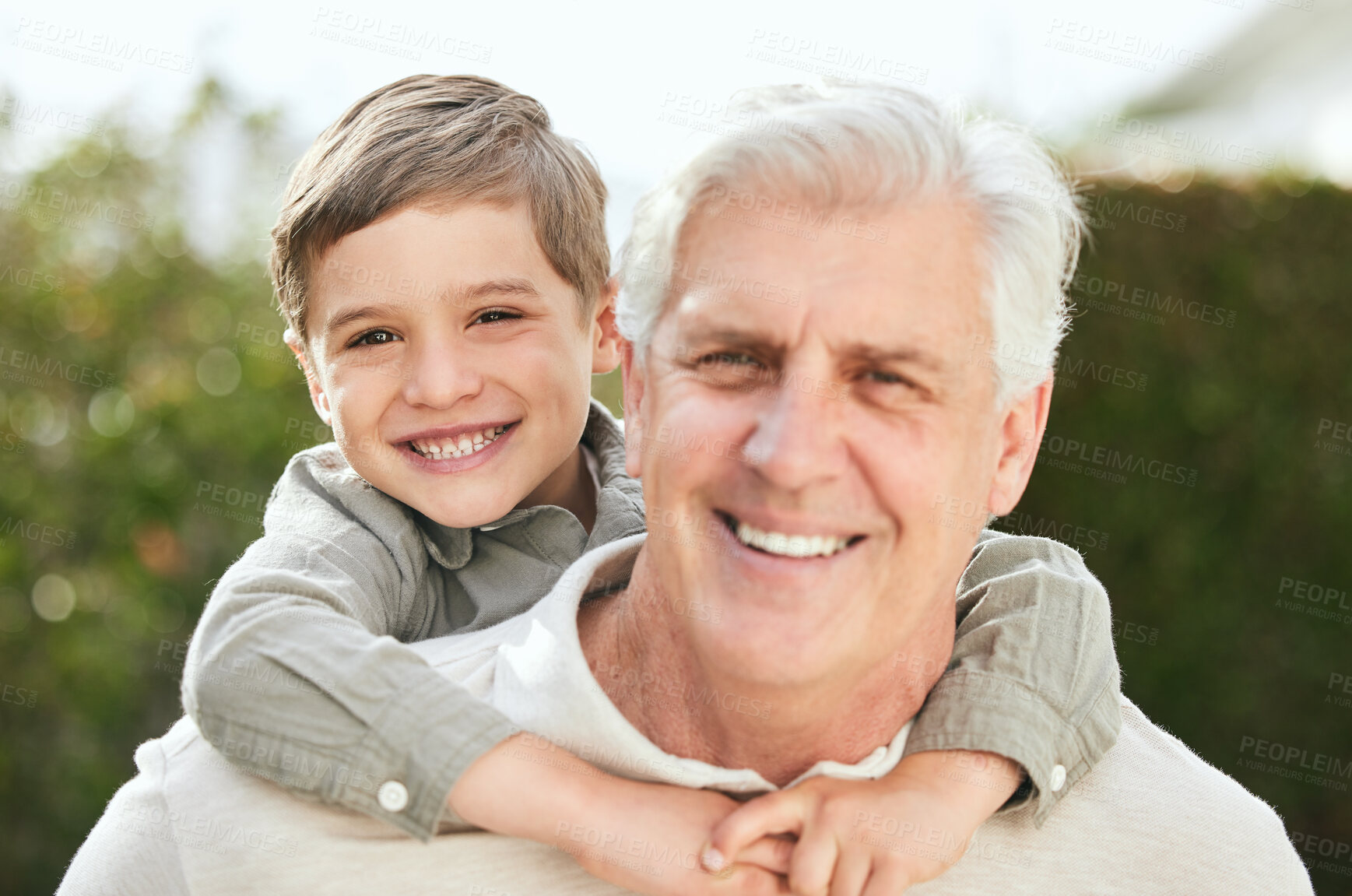 Buy stock photo Piggyback, portrait or smile with grandpa and boy child outdoor in garden of home together for bonding. Carry, face or love with happy senior man and grandson in backyard for fun, games or visit