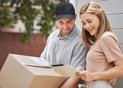 Buy stock photo Cropped shot of an attractive young woman using a tablet to sign for her delivery