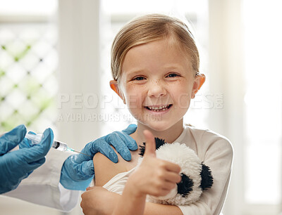 Buy stock photo Shot of a doctor giving a little girl an injection during a checkup at home