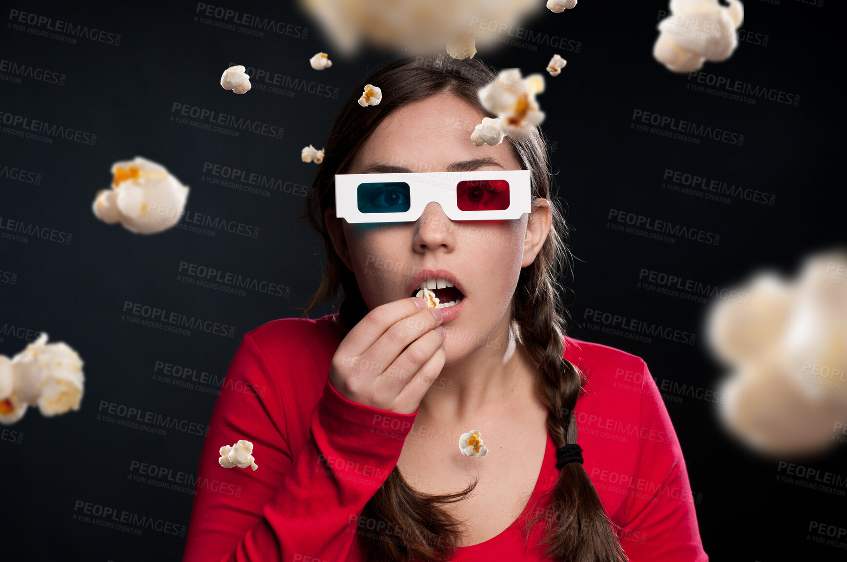 Buy stock photo Woman, 3d glasses and horror with popcorn for eating, watching movie or shocked by dark background. Fantasy, face or female person with snack in studio for mystery, film and color lenses with mockup
