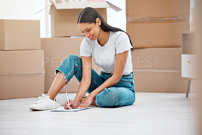 Buy stock photo Mortgage, boxes and woman moving in to house or apartment planning future investment. Paperwork, relax or homeowner in modern new home signing documents or contract while sitting on living room floor