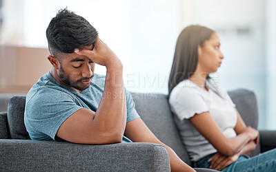 Buy stock photo Couple, fight and frustrated man depressed on living room sofa with relationship problem. Divorce fear, cheating anxiety and marriage crisis of young people on a lounge couch at home thinking