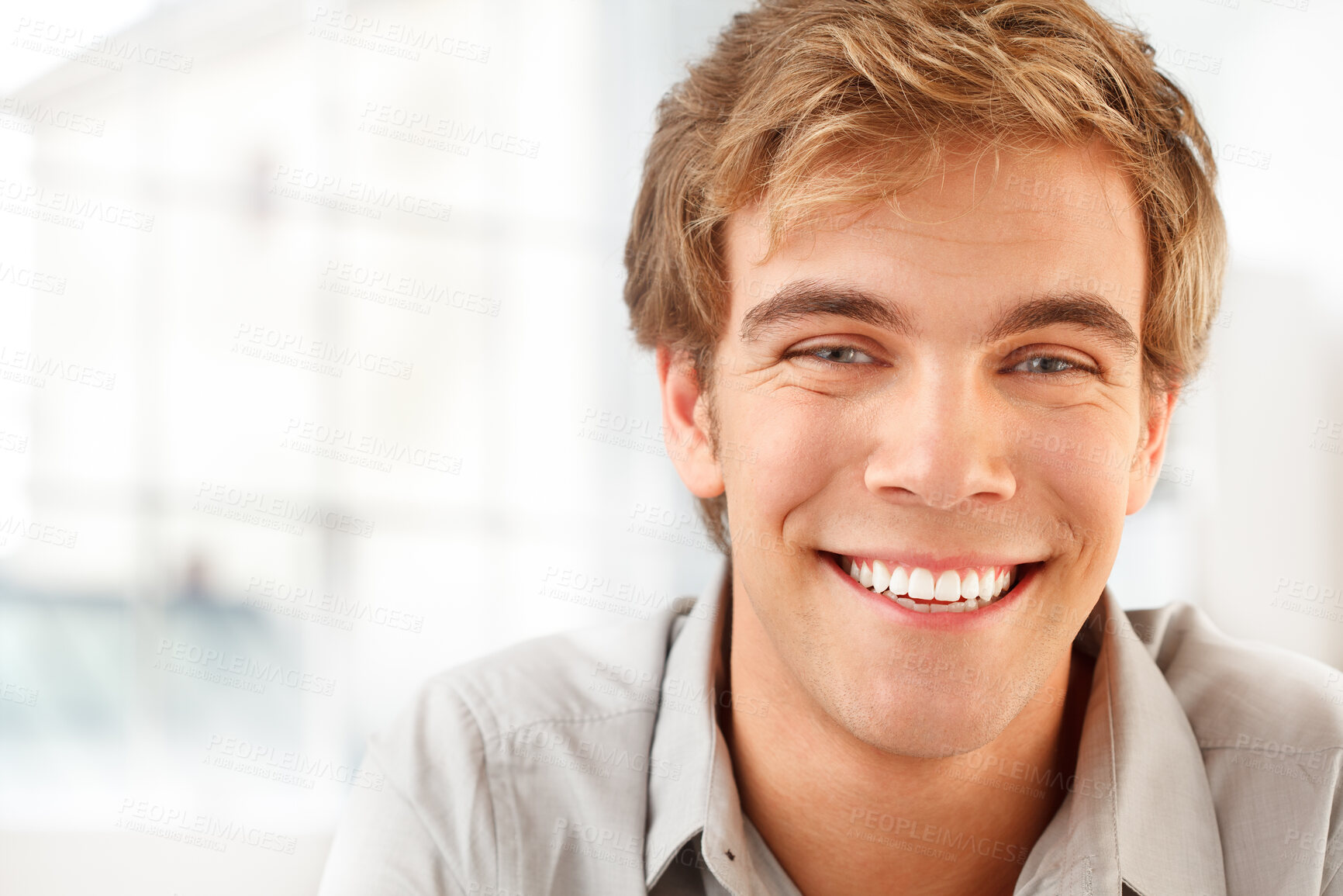 Buy stock photo Shot of a young man relaxing at home