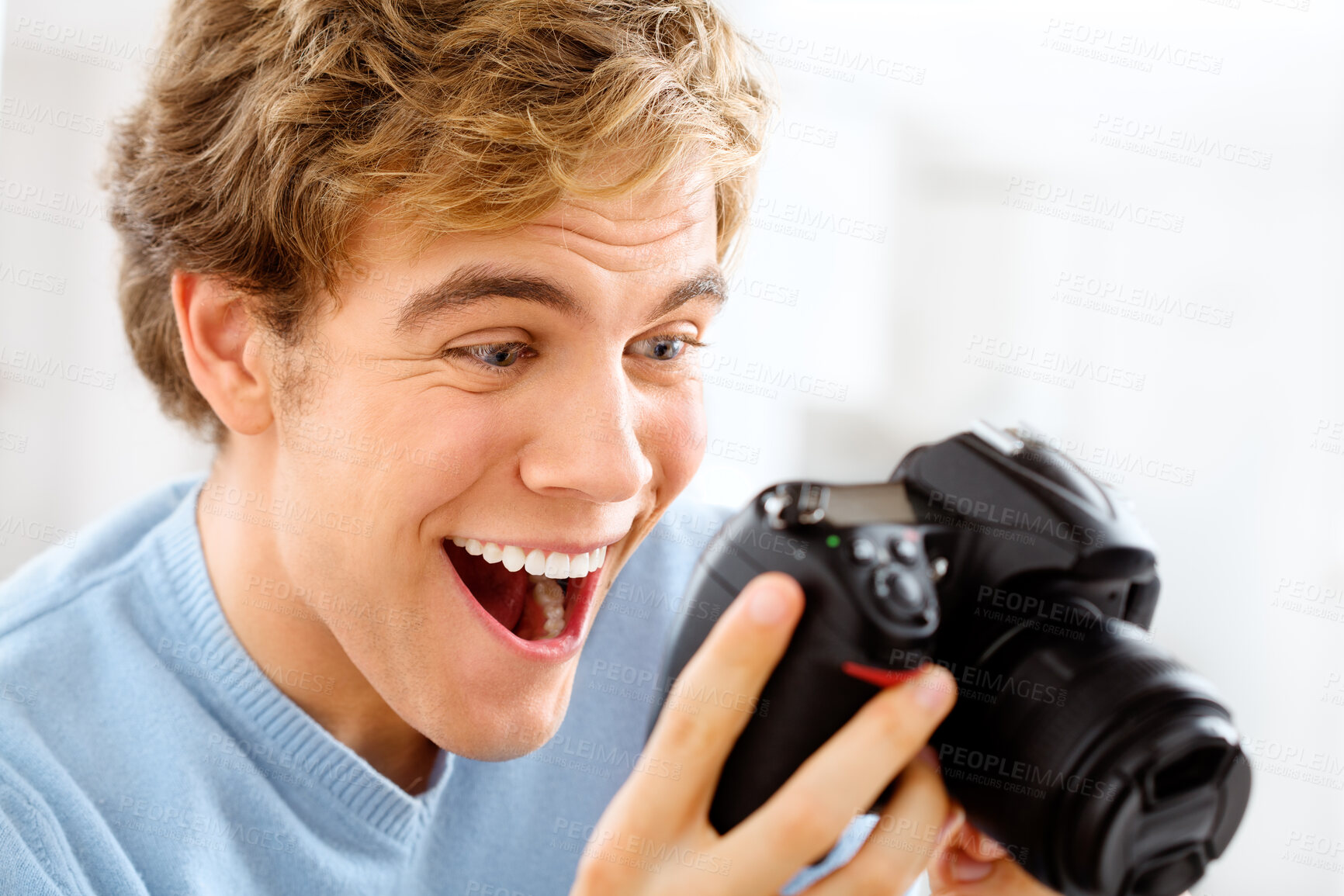 Buy stock photo Man, camera and happy to check picture, home and photography for media or photo art. Male person, equipment and confident for creative career or journalist, capture memories and shooting smile