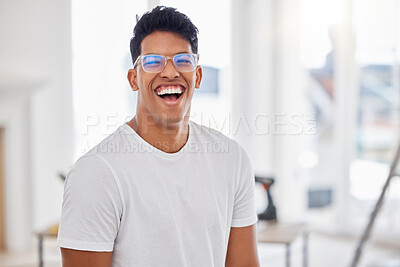 Buy stock photo Shot of a handsome young man  standing in a room under renovations