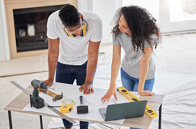 Buy stock photo Maintenance, renovation and diy planning with a couple in their new home together for a remodeling project. Construction, real estate or property blueprint with a man and woman talking in the house