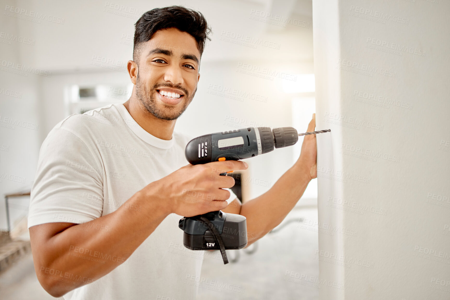 Buy stock photo Portrait, wall and man with drill tool for home with diy building, renovation or maintenance. Happy, designing and male person with electric construction equipment for repairs at house or apartment.