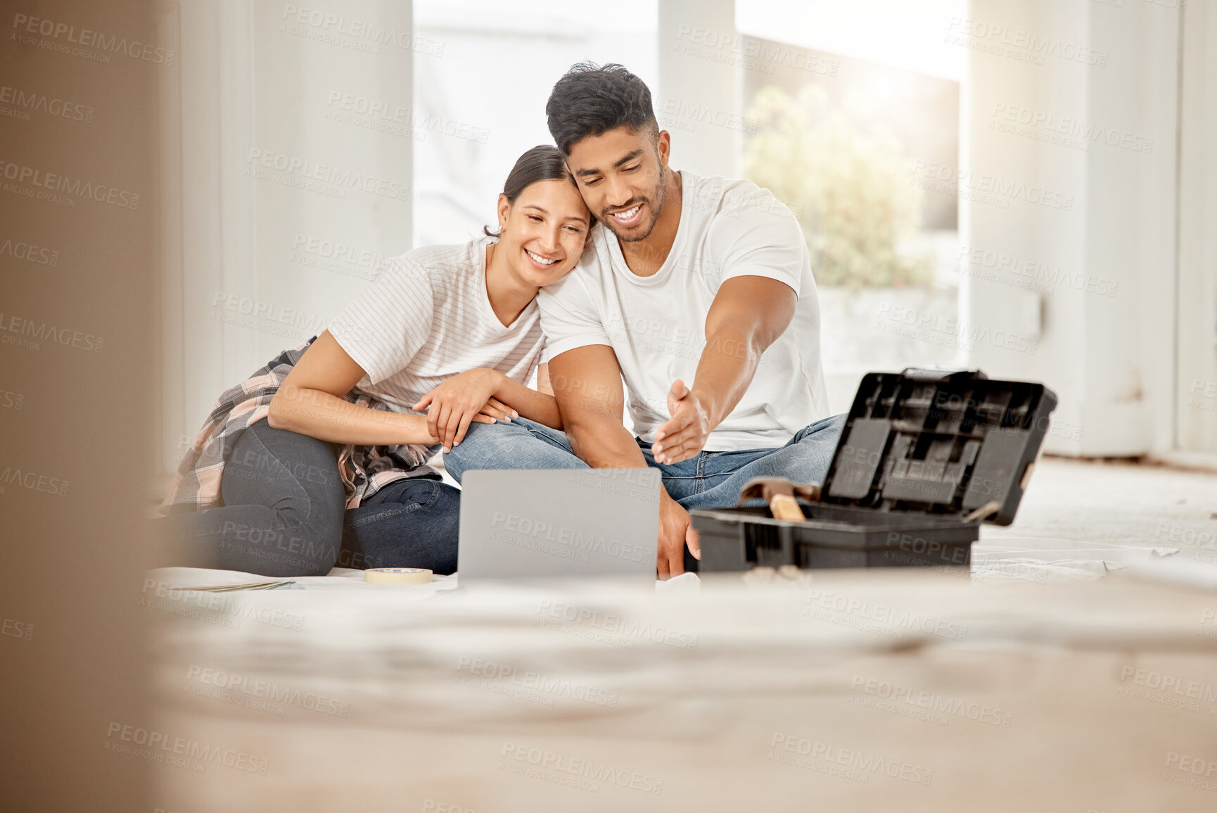 Buy stock photo Happy couple, interior design and research with laptop for building, DIY or renovation at home. Handyman and woman with smile on technology or floor in project, planning or house restoration together