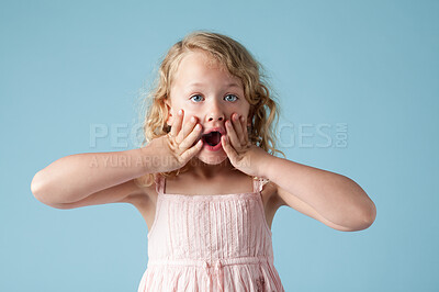 Buy stock photo Studio, little girl and portrait with wow for surprise, expression and isolated on blue background. Model, backdrop and kid for announcement with hand on face, reaction and shocked with mind blown