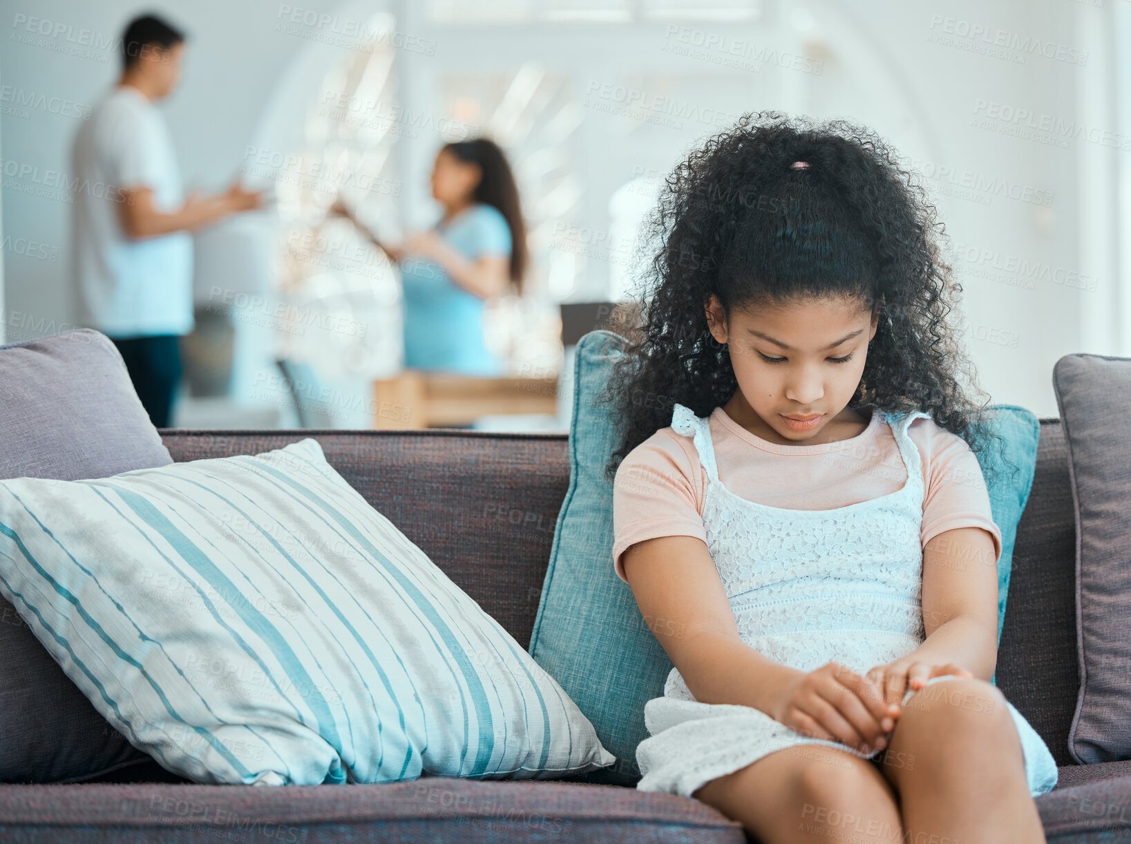 Buy stock photo Sad girl, home and parents with conflict, fighting and depression with disagreement in lounge. House, family and mother with father, unhappy child and divorce with custody battle, stress and anxiety