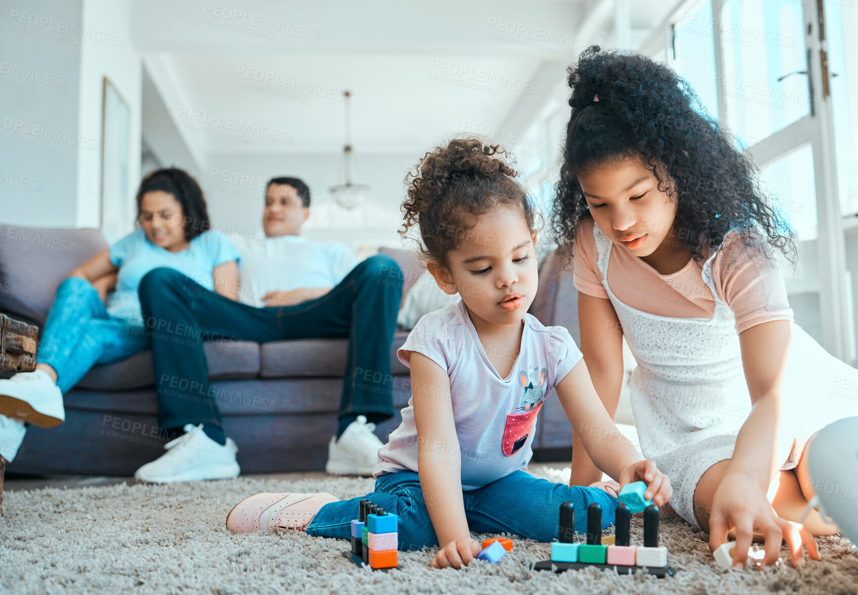 Buy stock photo Parents, kids or sisters playing with toys on floor to relax in home or family house with block pieces together. Break, girls or children siblings on carpet for bonding, growth development or support