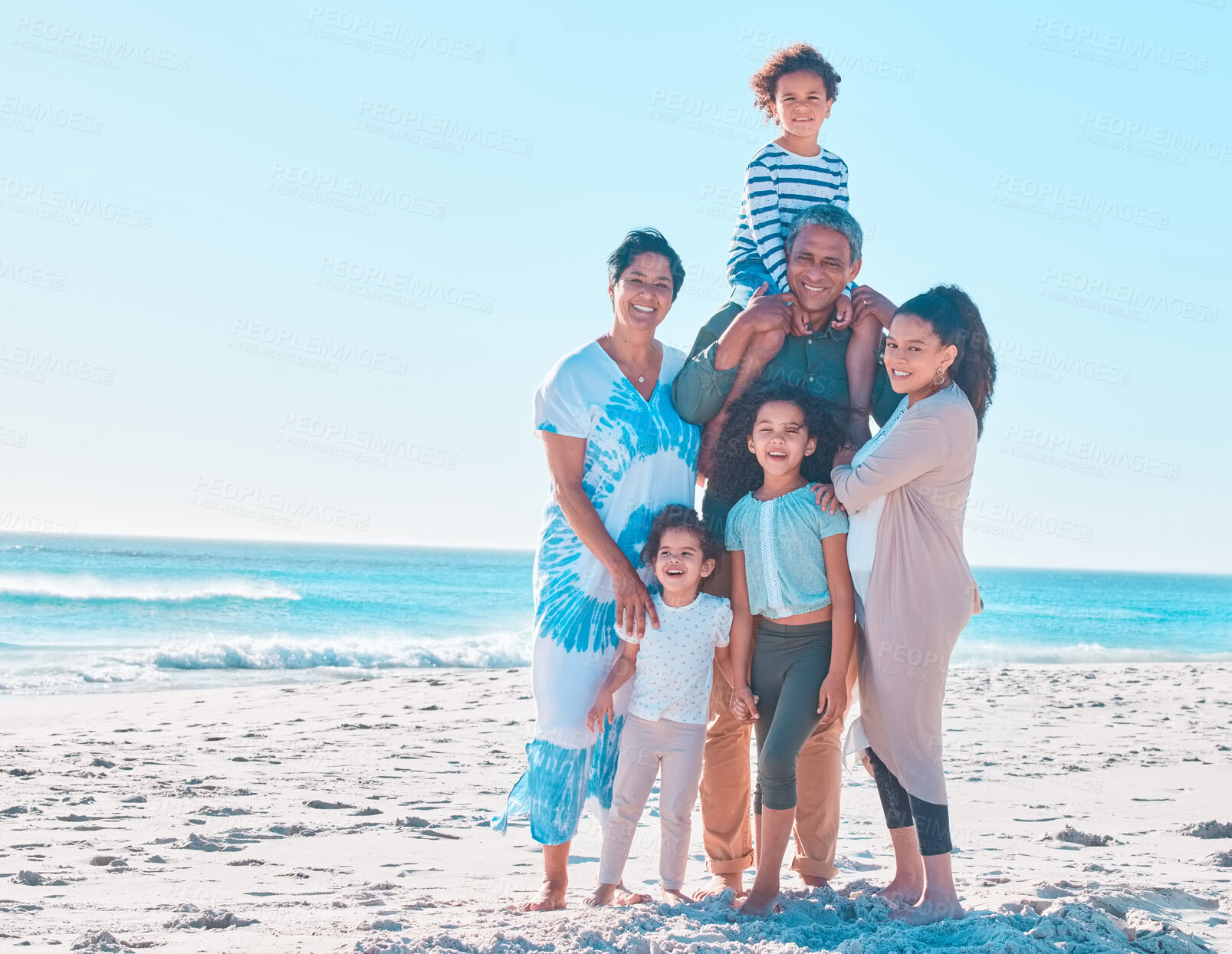 Buy stock photo Grandparents, mother and portrait of kids at beach for relax, piggyback or mockup space. Happy family, generations and people at sea for holiday, summer or travel on tropical island vacation together