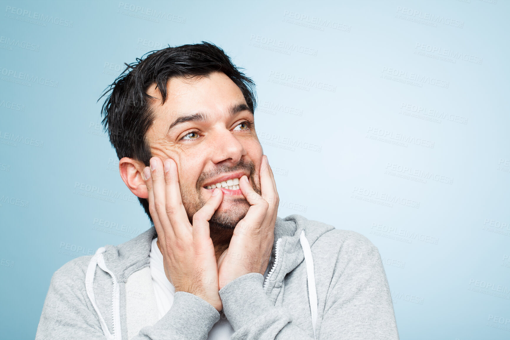 Buy stock photo Man, hands and happy with thinking in studio for opportunity, choice and decision on blue background. Mockup, smile and male person with wondering for solution, inspiration or brainstorming for ideas