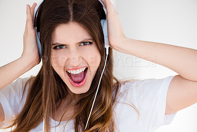 Buy stock photo Girl, portrait and headphones for music, singing and listening with cheerful, enjoying and subscription or streaming. Female person, gen z and home with happy for radio, podcast or audio on headset