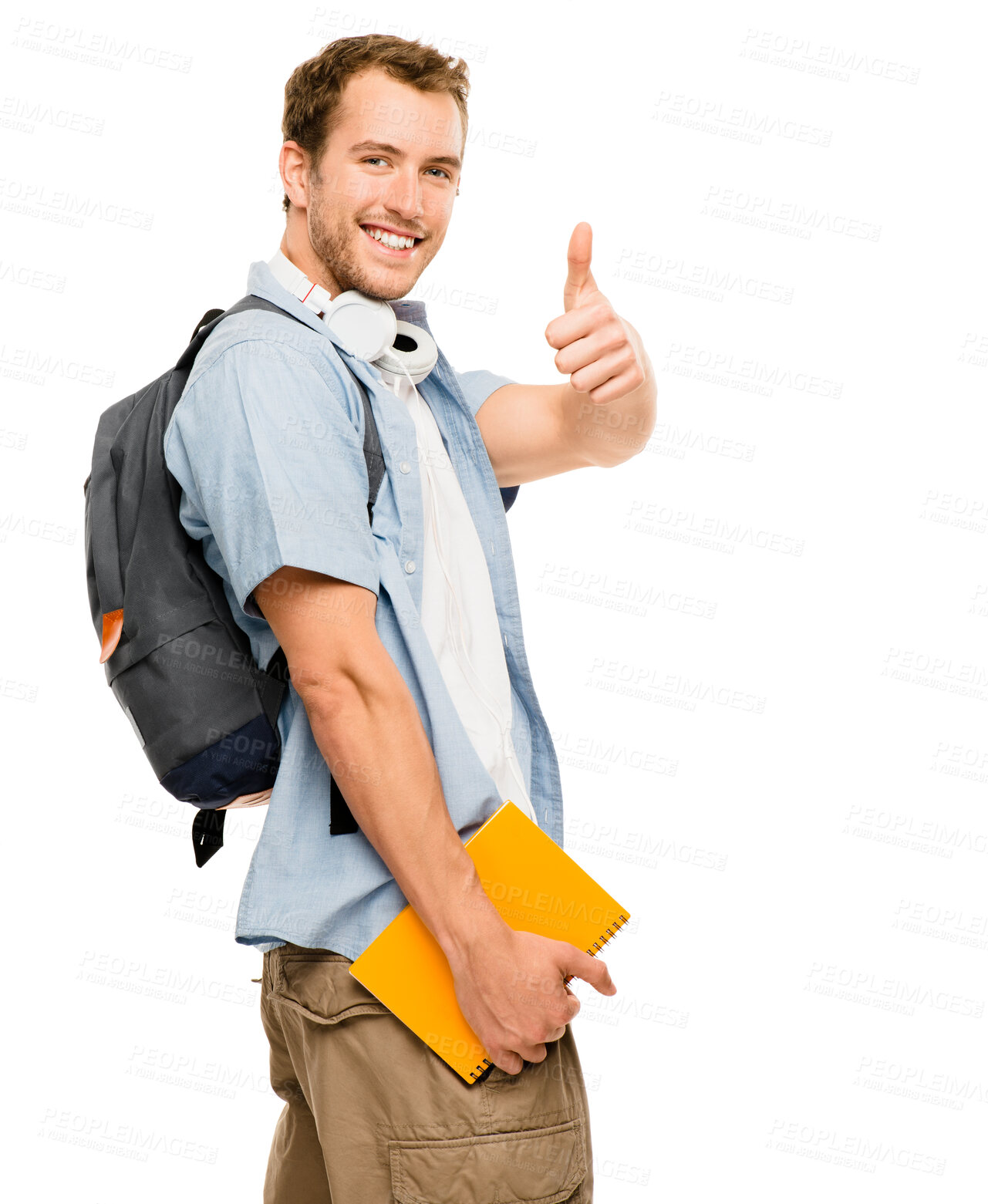 Buy stock photo Student, man and portrait with thumbs up in studio, good job and university learner with hand gesture for review. Headphones, notebook and education or knowledge, white background and scholarship